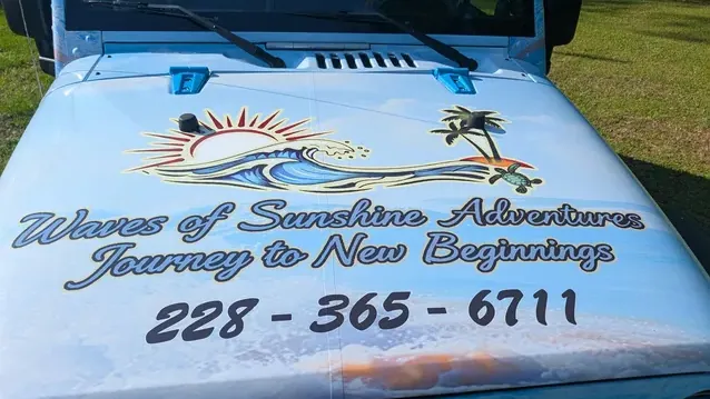 Hood artwork wrapped for Waves of Sunshine Adventures